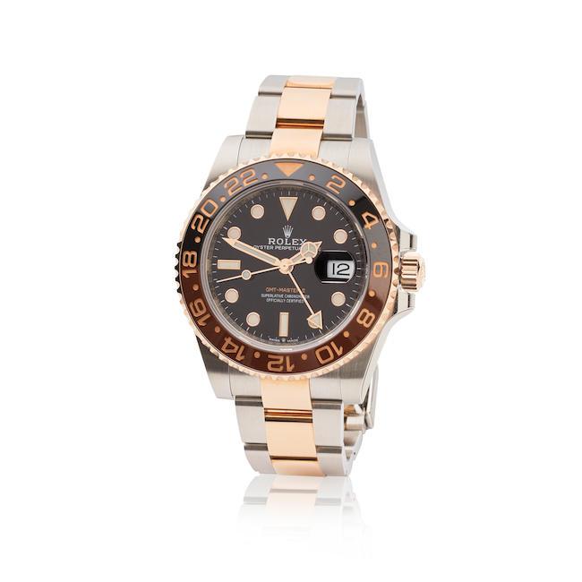 Rolex. A fine 18K rose gold and stainless steel automatic calendar bracelet watch with dual time zone Rolex. Belle montre bracelet en or rose 18K (750) et acier avec date et second fuseau horaire mouvement automatique GMT-Master II 'Root beer', Ref: 126711CHNR, Purchased 25th December 2021